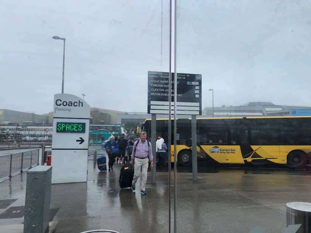 Coach park at Dublin airport in rain
